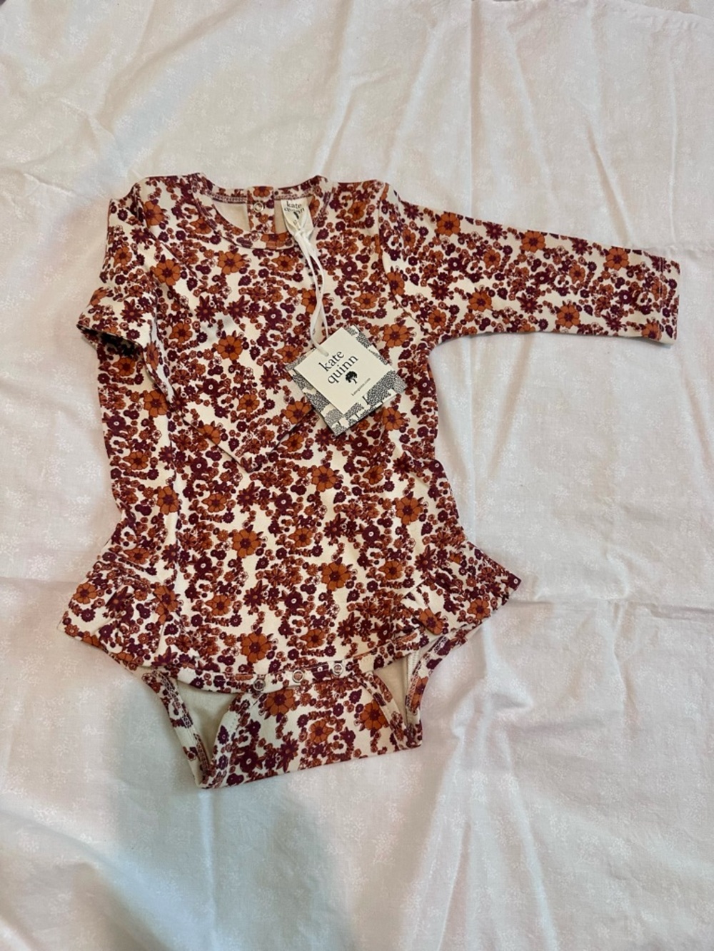 kate quinn Fall Ditsy Long-Sleeve Ruffle Leg Bodysuit
